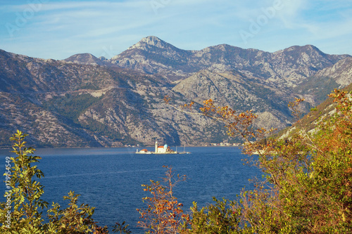 Bay of Kotor and island of Our Lady of The Rocks (Gospa od Skrpjela). Bright autumn in Montenegro