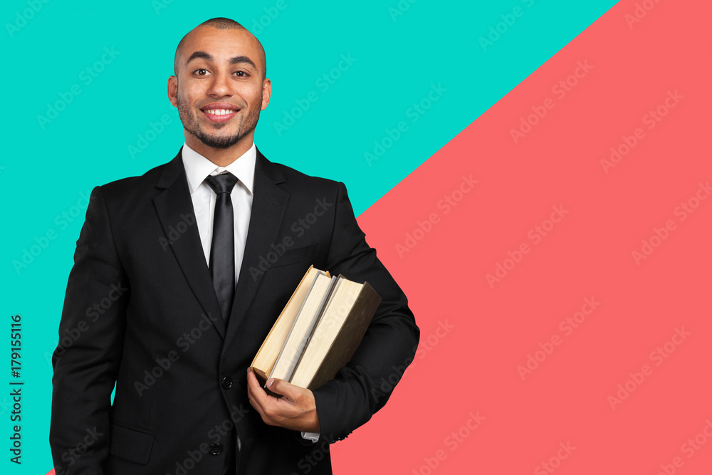 Young african american black student holding books Young african american black student holding books