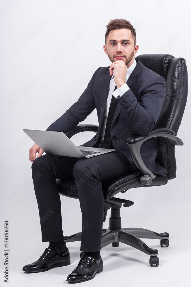 Picture of attractive businessman with computer Picture of attractive businessman with computer