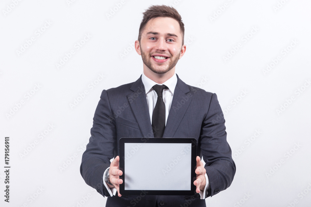 Picture of attractive businessman with tablet computer Picture of attractive businessman with tablet computer