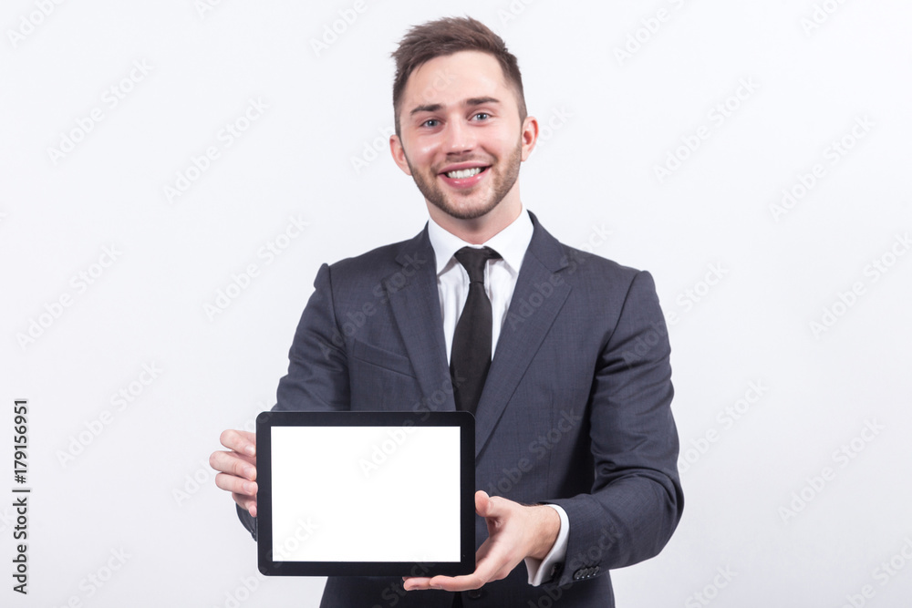 Picture of attractive businessman with tablet computer Picture of attractive businessman with tablet computer