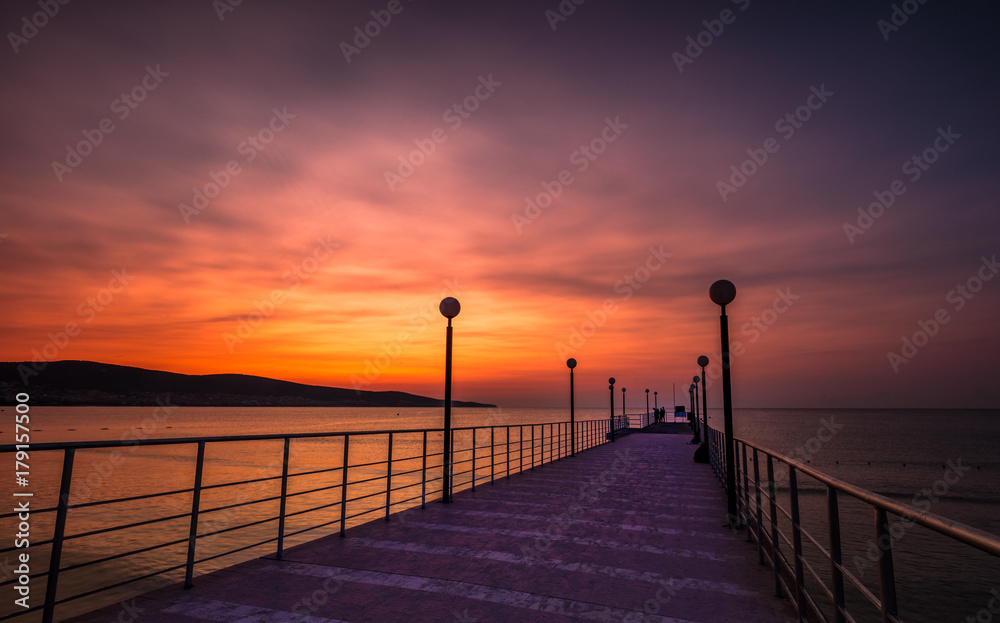 Pier in the sunrise
