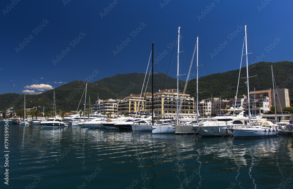 Luxury yachts in Porto Montenegro, prestigious shopping village and yacht port