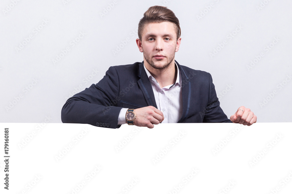 Picture of serious businessman standing Picture of serious businessman standing