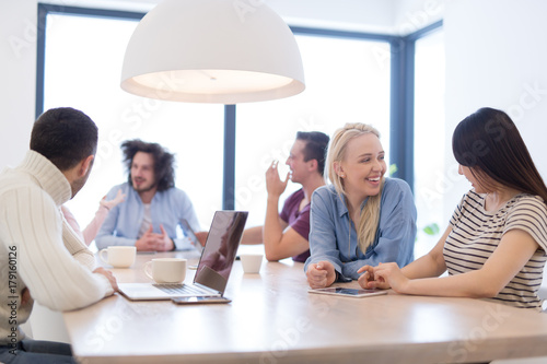 Startup Business Team At A Meeting at modern office building