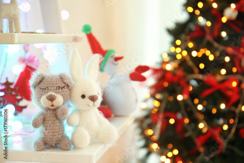 Funny small toys on shelf a...
