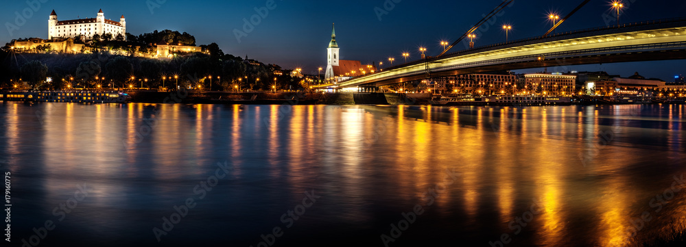 Bratislava castle,Parliament and the New bridge over Danube river with evening lights in capital city of Slovakia,Bratislava