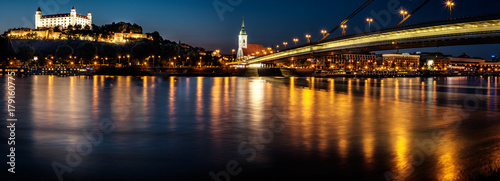 Bratislava castle Parliament and the New bridge over Danube river with evening lights in capital city of Slovakia Bratislava