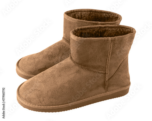 Brown pair of short winter ugg boots isolated white