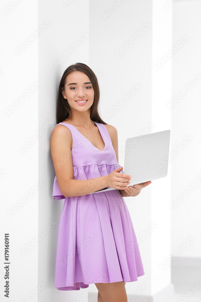 Pretty woman with modern laptop at home Pretty woman with modern laptop at home