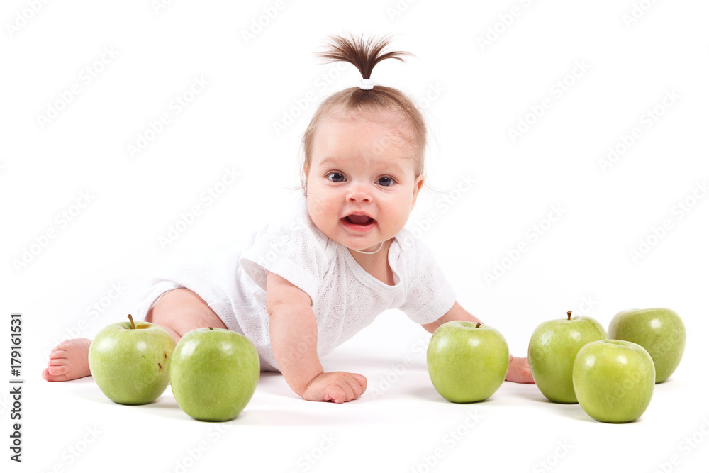 cute confusedl little girl in white shirt and with apples cute confusedl little girl in white shirt and with apples
