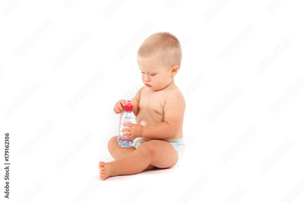 cute boy in diapers with water bottle cute boy in diapers with water bottle