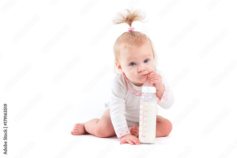 cute cheerful little girl in white dress and with milk bottle cute cheerful little girl in white dress and with milk bottle