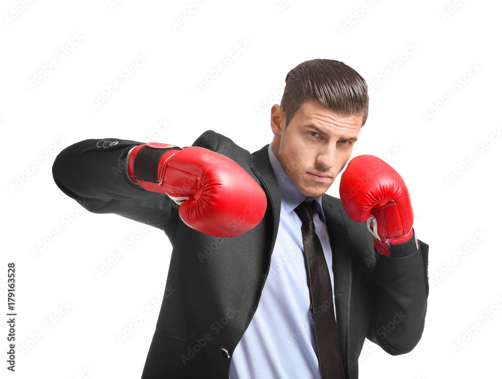 Businessman in boxing gloves on white background Businessman in boxing gloves on white background