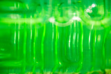 green plastic texture background close up.green transparent texture. Abstract background and texture for designers.