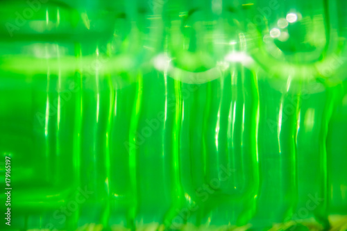 green plastic texture background close up.green transparent texture. Abstract background and texture for designers.