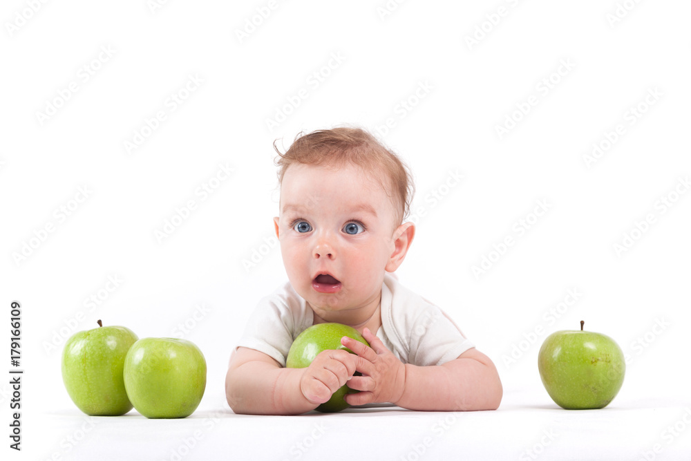 cute happy little boy in white shirt hold green apple cute happy little boy in white shirt hold green apple