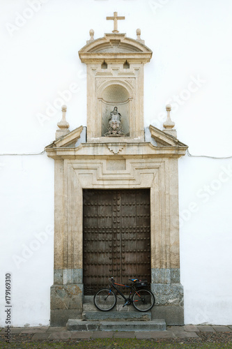 The bicycle in front of old door. Cordoba, Spain.