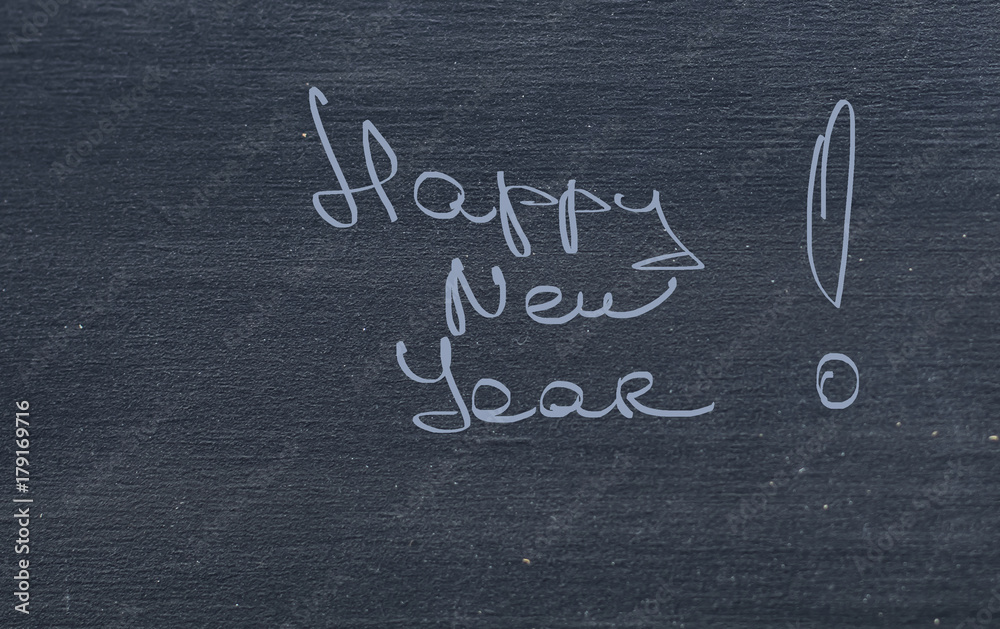 Fototapeta premium Happy New Year Greetings on Chalkboard