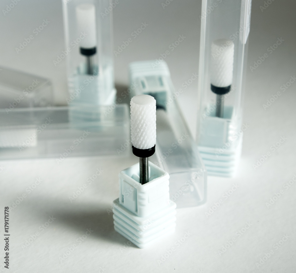 Burs for podiatry, ceramic nail drill bits cilinder form. Medical instrument.
