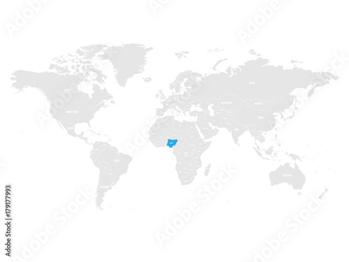 Fototapeta Naklejka Na Ścianę i Meble -  Nigeria marked by blue in grey World political map. Vector illustration.