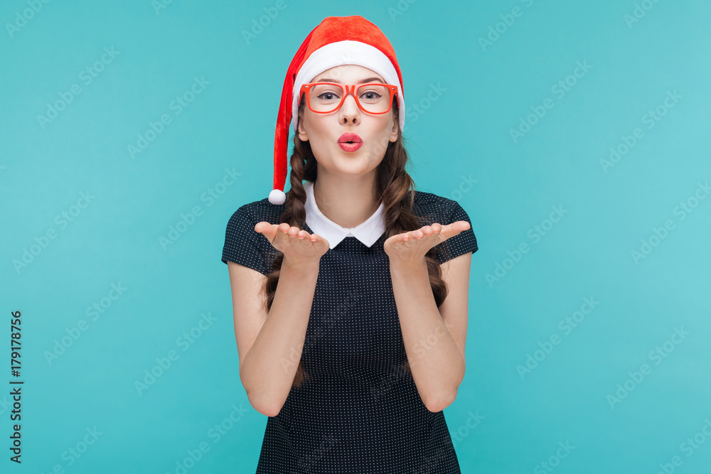 Businesswoman send air kiss at camera. Businesswoman send air kiss at camera.