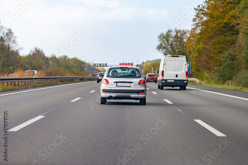 silver car drives on a german motorway