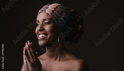 beautiful african woman wearing a traditional headwrap