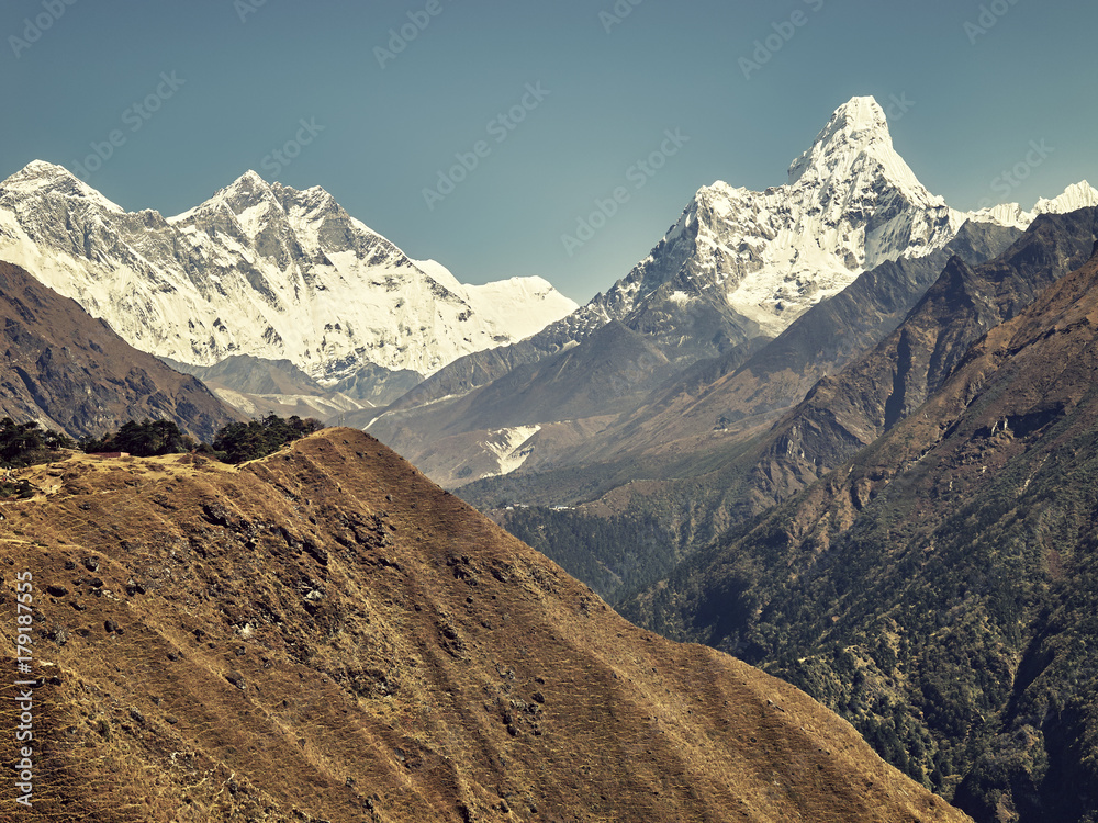 Retro stylized picture of Ama Dablam Mountain in the Everest Region of the Himalayas, Nepal.