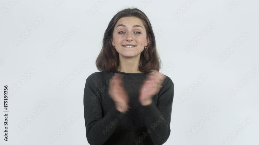 The girl exults and claps her hands The girl exults and claps her hands