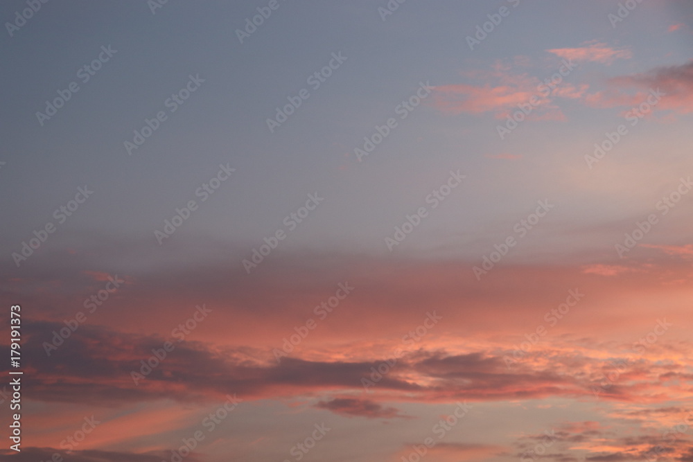 Sky with orange clouds beautiful in nature sunset background 