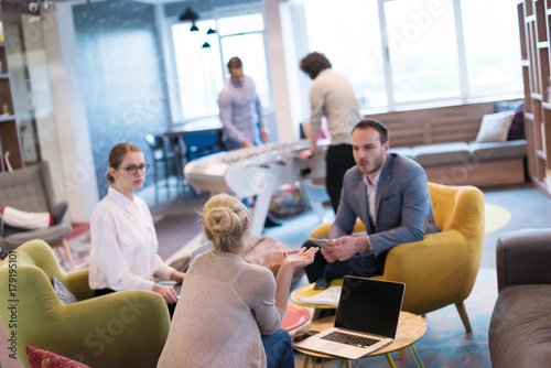 Startup Business Team At A Meeting at modern office building