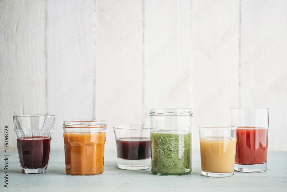 Food: Different colorful smoothies in glasses Food: Different colorful smoothies in glasses