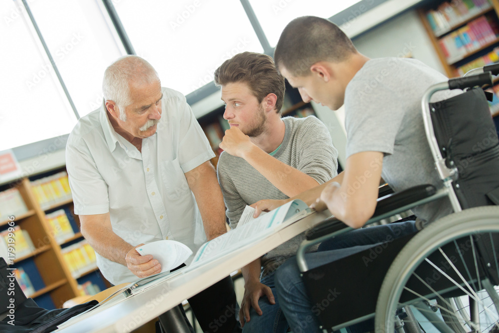 student in wheelchair in class student in wheelchair in class