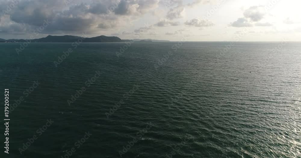 Aerial view flying over tropical blue ocean in thailand Aerial view flying over tropical blue ocean in thailand