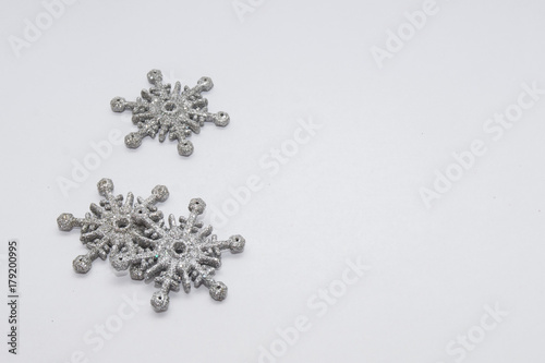Silver christmas stars with white background