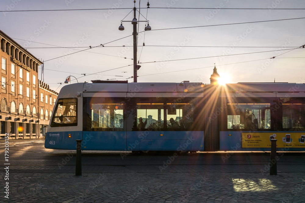 Gothenburg, Sweden - August 23, 2017: A Modern Blue Tram in Gothenburg with Sunflares