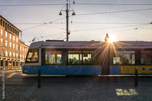 Gothenburg, Sweden - August 23, 2017: A Modern Blue Tram in Gothenburg with Sunflares