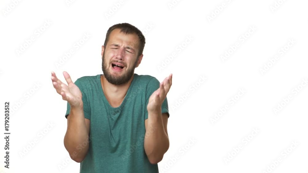 portrait of disappointed adult man suffering crying being in trouble screaming touching head over white background closeup copy space. Concept of emotions portrait of disappointed adult man suffering crying being in trouble screaming touching head over white background closeup copy space. Concept of emotions