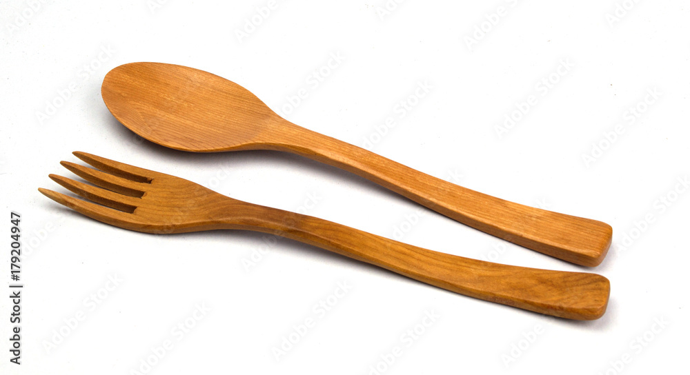 Wooden spoon and fork isolated on white background Wooden spoon and fork isolated on white background