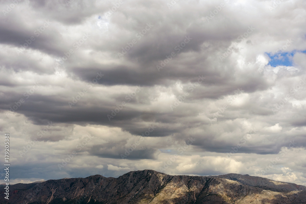Cumulus clouds over the mountains Cumulus clouds over the mountains