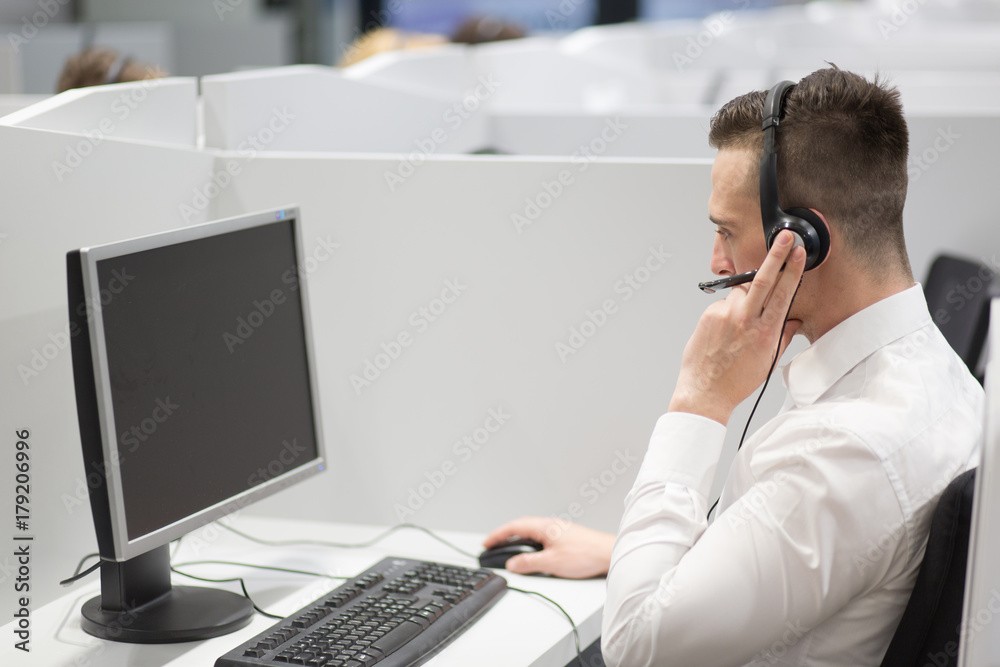male call centre operator doing his job male call centre operator doing his job