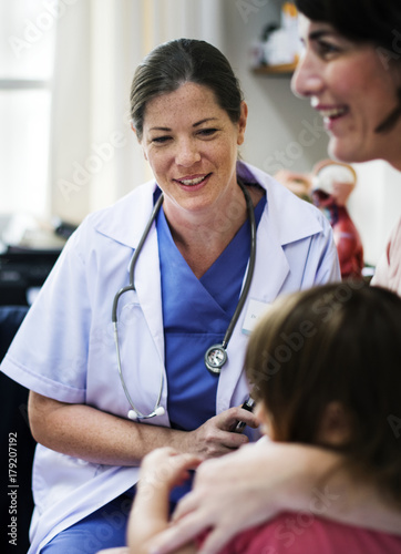 Young patient getting checked by a doctor