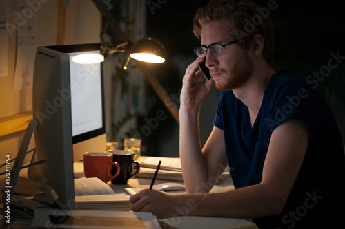 College Student Studying at Night photo