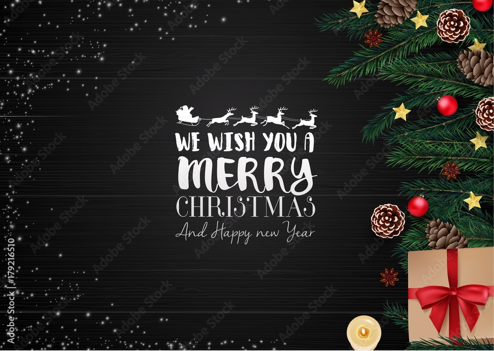 Naklejka premium Christmas wooden background with christmas elements