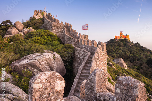 Moorish Castle and Pena Palace at sunset in Sintra, Portugal. photo