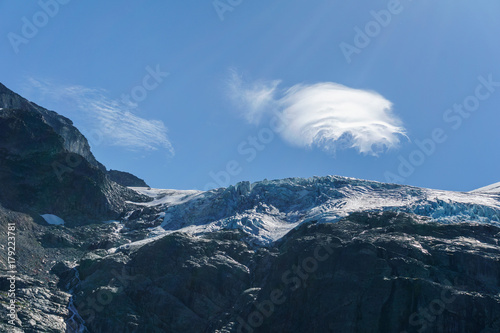 Great view of the white cloud over mountains dramatic scene. Beauty world.