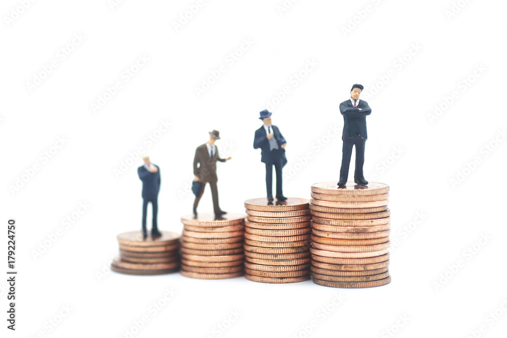 Miniature people: small figures businessmen Miniature people: small figures businessmen