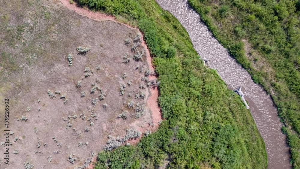 Aerial view looking down following river upstream part 2. Aerial view looking down following river upstream part 2.
