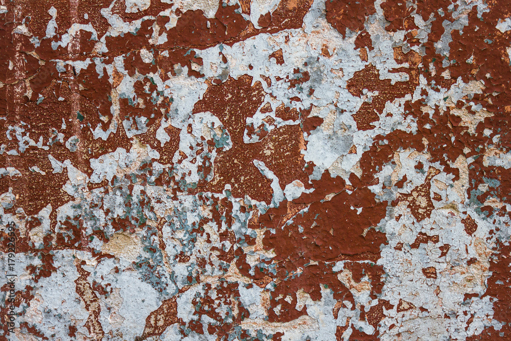 A brown, dilapidated wall. A brown, dilapidated wall.